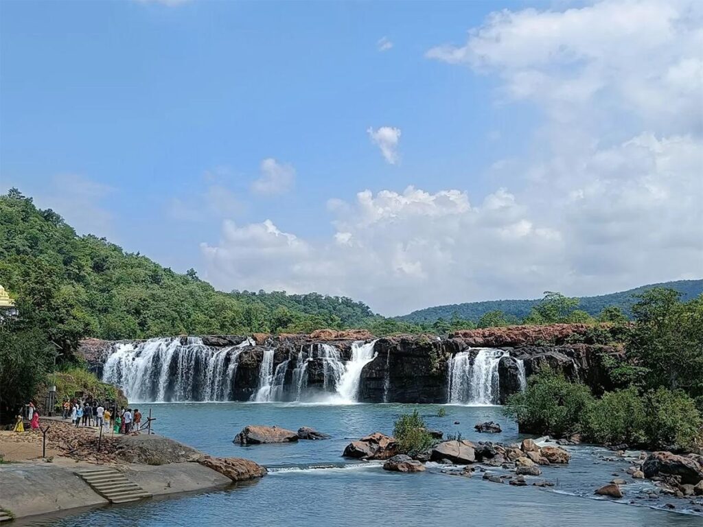 Bogatha Waterfall cascading through lush green forests in Mulugu district, Telangana