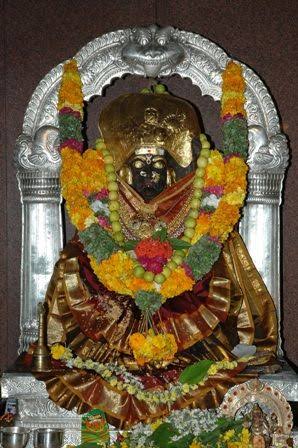 Jogulamba Temple in Alampur, Telangana, featuring its colorful gopuram and temple entrance.